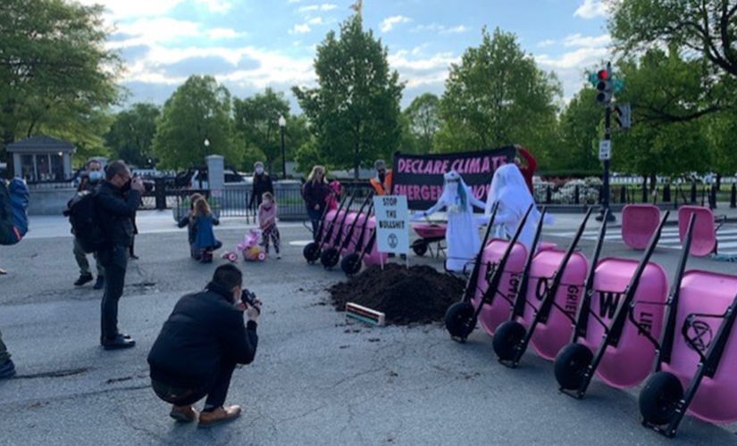 Left-wing group dumps cow poop at White House entrance, demands Biden take climate action