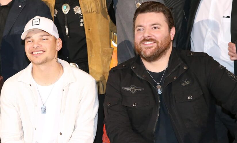 Chris Young surprises Kane Brown on stage to perform their duet ‘Famous Friends’