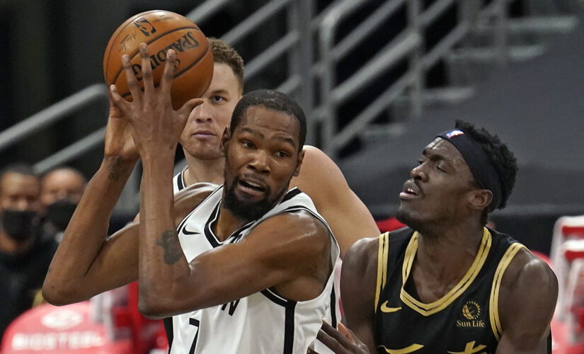 Durant, Nets rally past Raptors 116-103, clinch playoff spot