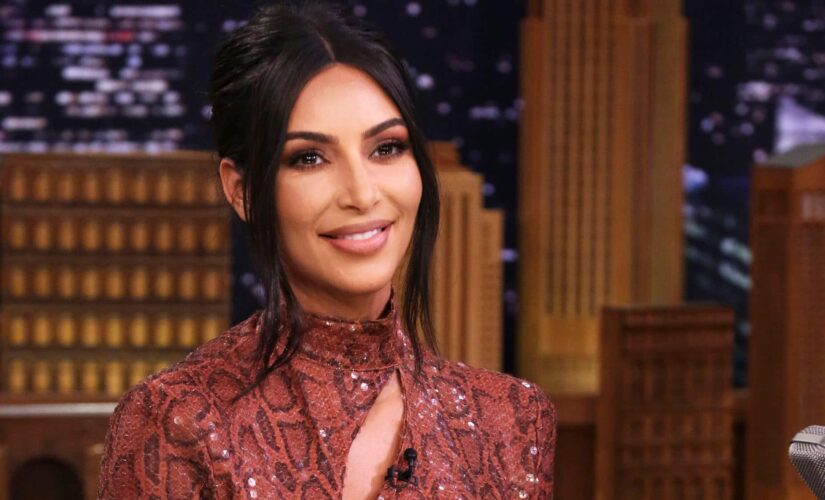 Kim Kardashian preps for bar exam in tiny bikini: ‘Studying in the sun’