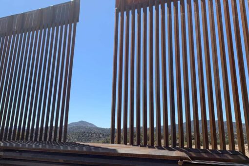 Nighttime border footage shows group of adult men and small children discovered by authorities