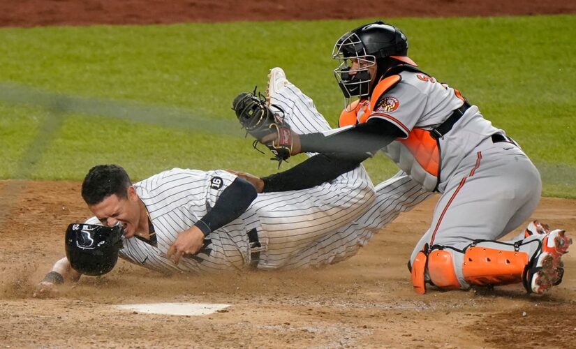 Santander hoses Urshela for last out, O’s beat Yanks in 11