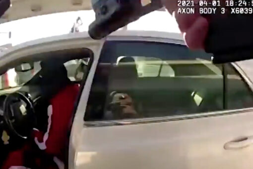 Suspect fatally shot as he dragged Illinois cops at gas station, video shows