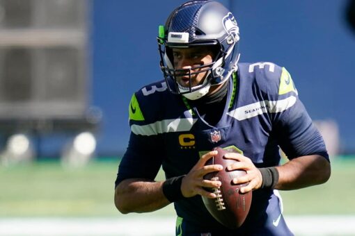 Russell Wilson told Carlos Dunlap ‘he’s here to stay’ before re-signing, Seahawks player says