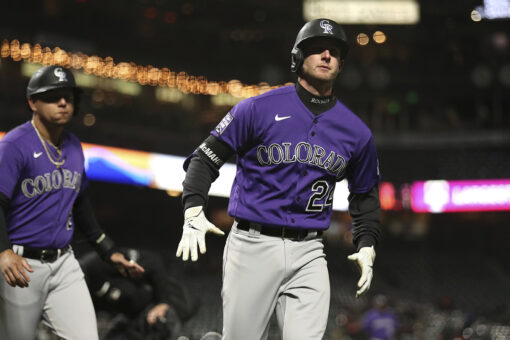 Rockies finally win on the road, beat Giants 7-5 in 10