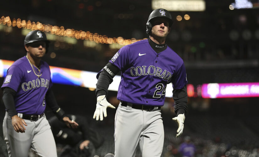 Rockies finally win on the road, beat Giants 7-5 in 10