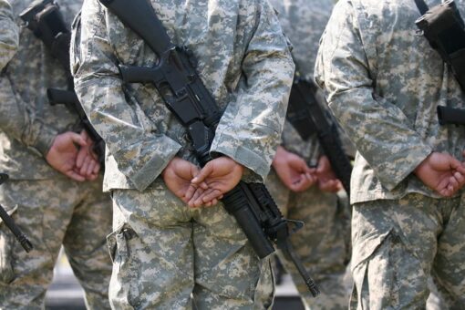 AWOL Army soldier tried to bring gun on flight, claimed to be law enforcement officer, prosecutors say