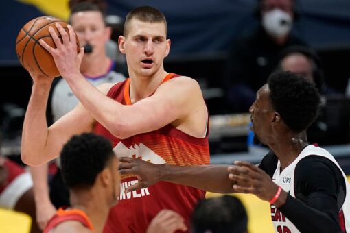 Jokic’s triple-double leads Nuggets over Heat 123-106