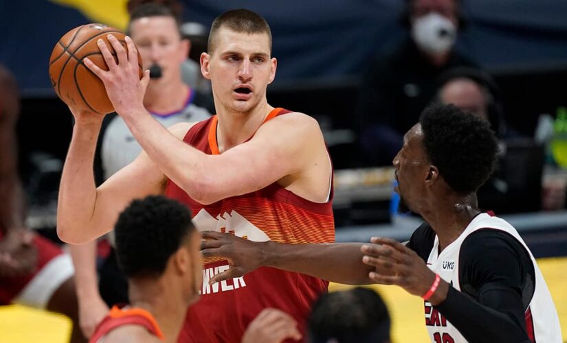 Jokic’s triple-double leads Nuggets over Heat 123-106