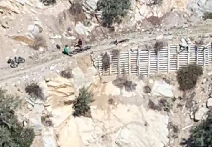 LA mountain biker dangles from side of cliff, is rescued by helicopter