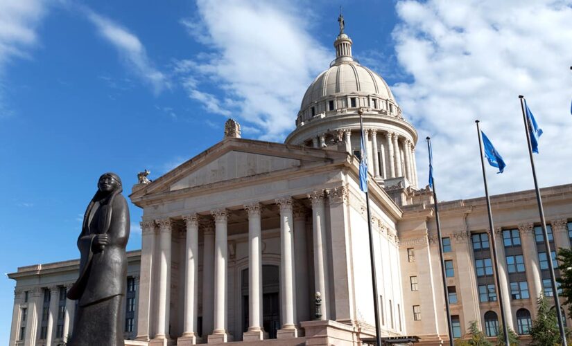 Oklahoma governor signs bill to protect drivers who hit rioters, as protesters try breaking into Senate