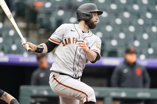 Belt slam in 10-run 1st lifts Giants over Rockies in opener