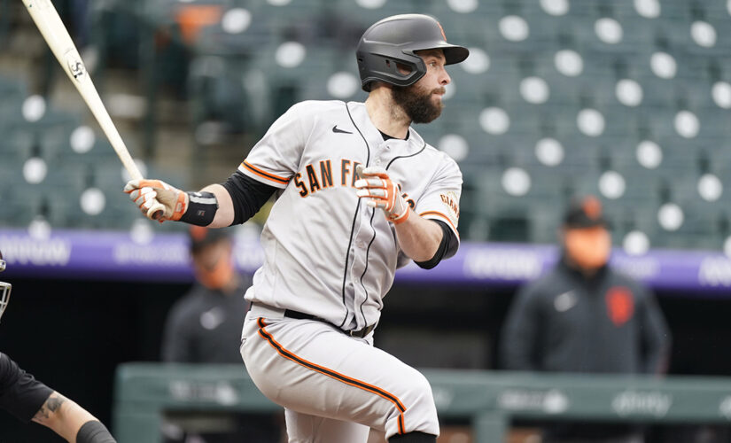Belt slam in 10-run 1st lifts Giants over Rockies in opener