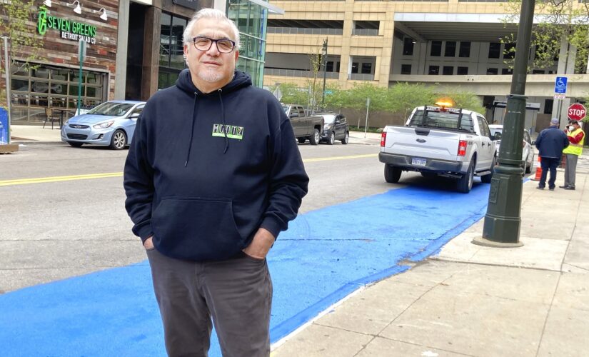 Detroit pizza man paints street, tries to save people dough