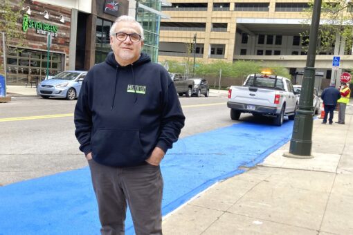 Detroit pizza man paints street, tries to save people dough