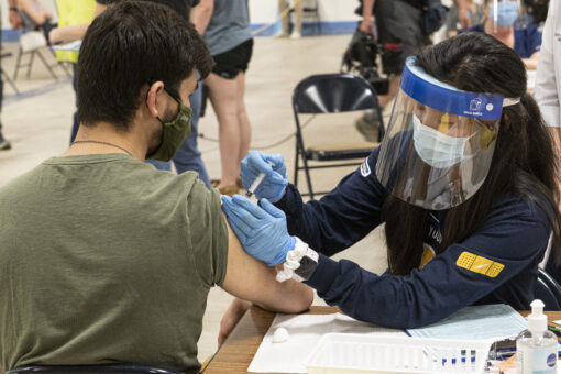 As US reopens, campuses tighten restrictions for virus