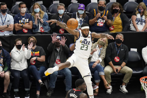 NBA-leading Jazz beat Rockets 124-116 for 50th victory