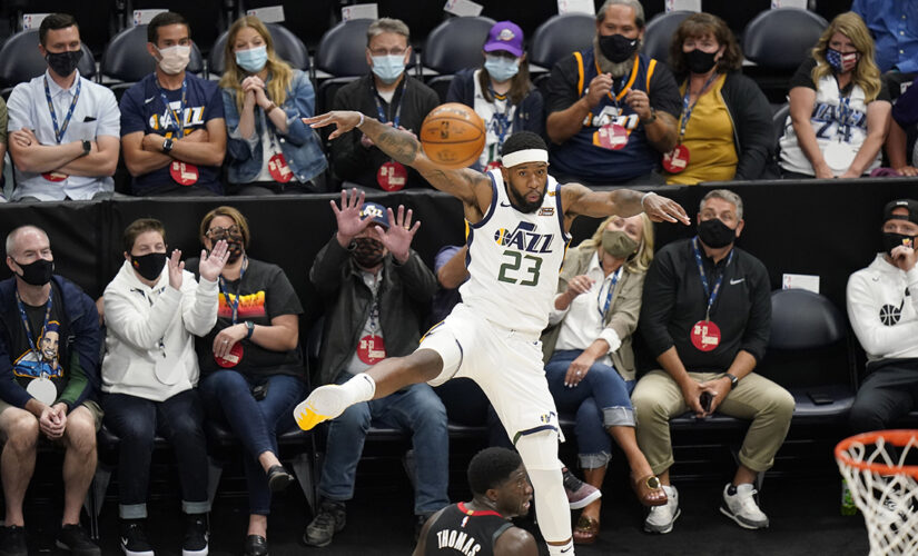 NBA-leading Jazz beat Rockets 124-116 for 50th victory