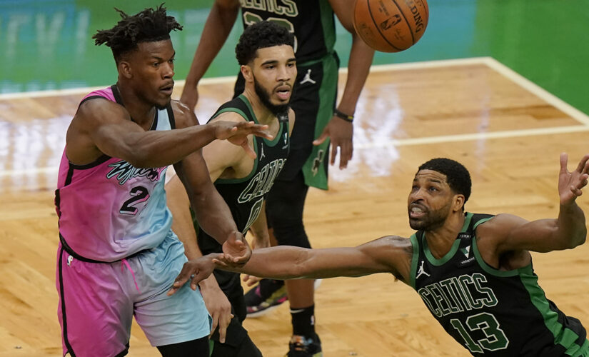 Butler strong down stretch, Heat hold off Celtics 130-124