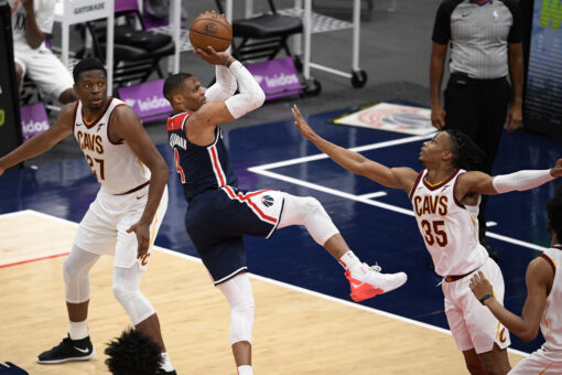 Wizards beat Cavaliers 120-105, clinch East play-in spot