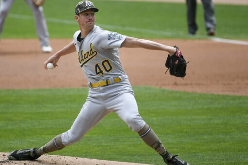 Wild pitch in the 9th lifts Athletics past Twins 7-6