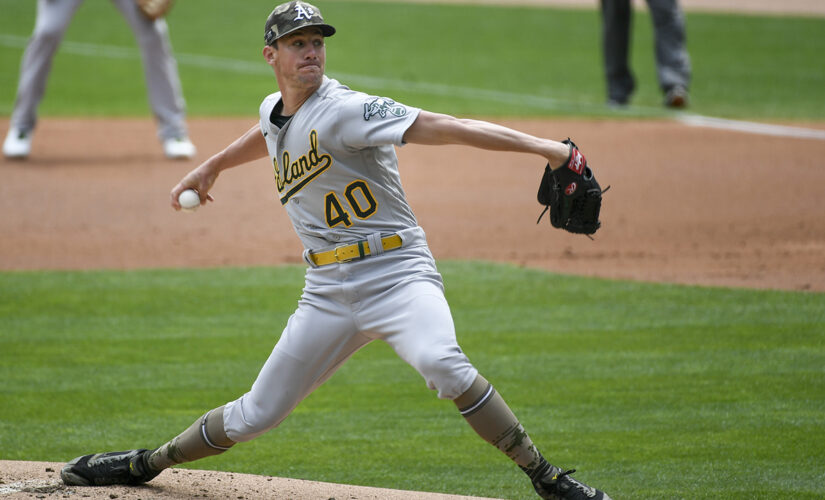 Wild pitch in the 9th lifts Athletics past Twins 7-6