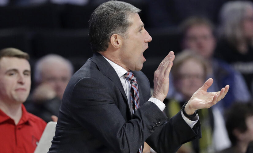 Former Louisville assistant charged by feds with extortion