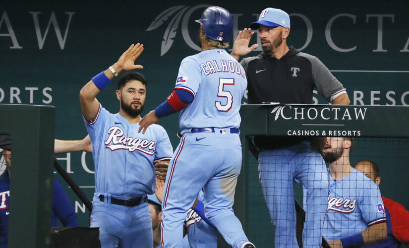 García beats Astros in 10th again, Rangers sweep in 3-2 win