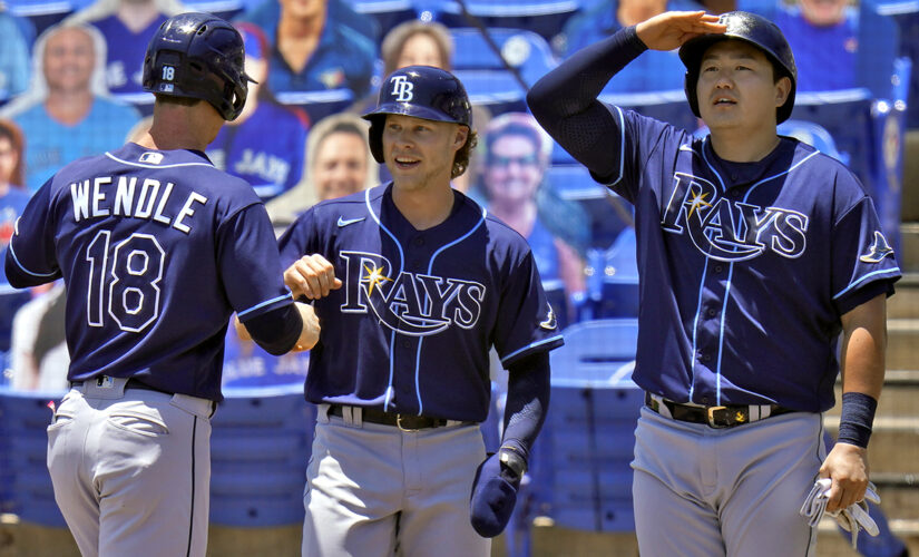 Rays win 11th in a row, score 7 in 11th to beat Toronto 14-8