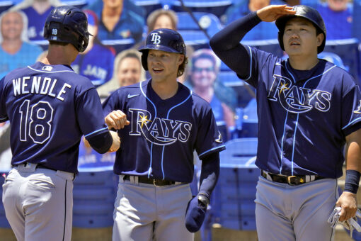 Rays win 11th in a row, score 7 in 11th to beat Toronto 14-8