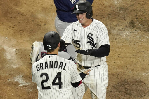 Vaughn hits 1st HR, White Sox top Twins 13-8, win 5th in row