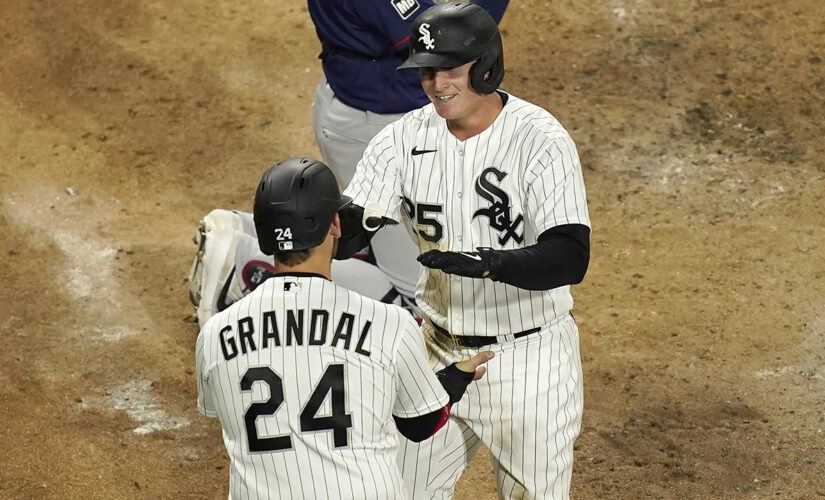 Vaughn hits 1st HR, White Sox top Twins 13-8, win 5th in row