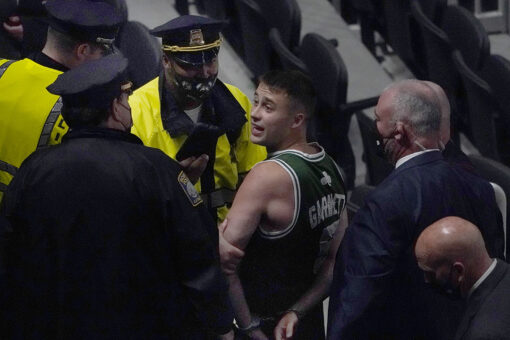 Celtics fan who appeared to throw water bottle at Kyrie Irving identified, facing charges