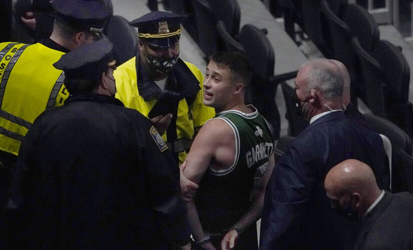 Celtics fan who appeared to throw water bottle at Kyrie Irving identified, facing charges