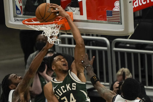 Antetokounmpo scores 49 points as Bucks beat Nets 117-114