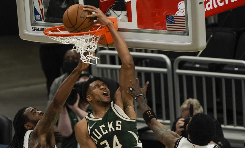 Antetokounmpo scores 49 points as Bucks beat Nets 117-114