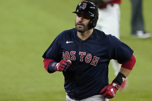 Martinez 2 HRs, leads majors with 9, as Red Sox beat Rangers