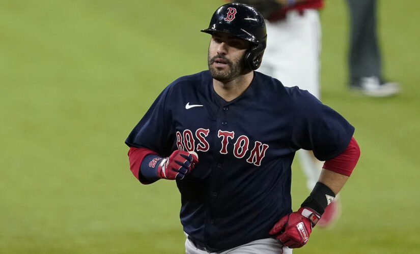 Martinez 2 HRs, leads majors with 9, as Red Sox beat Rangers