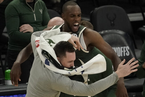 Khris Middleton lifts Bucks past Heat in OT in Game 1