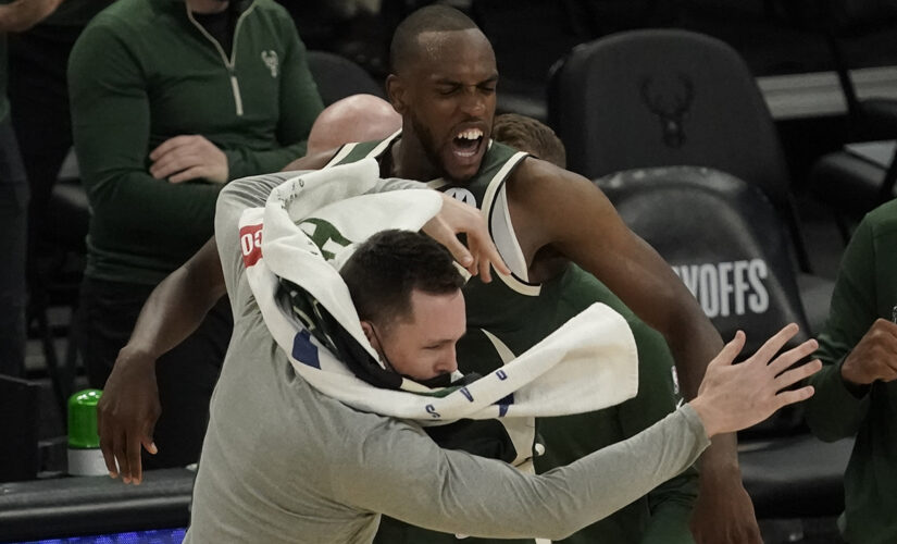 Khris Middleton lifts Bucks past Heat in OT in Game 1