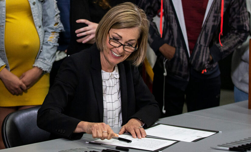 Iowa gov signs bill banning mask mandates in schools
