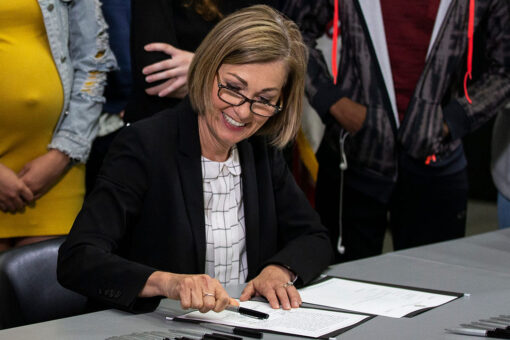 Iowa gov signs bill banning mask mandates in schools
