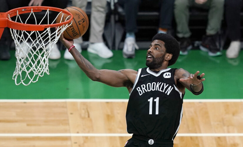 Nets’ Kyrie Irving stomps, scrapes his foot across Celtics logo