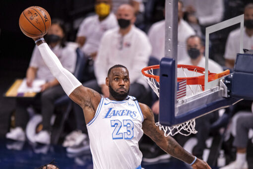 James returns as he and Davis send Lakers by Pacers 122-115