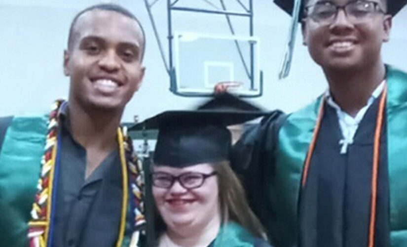 Oklahoma teens praised for friendship with student with Down syndrome, as graduation photo goes viral