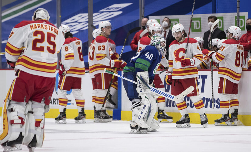 Lindholm’s OT goal lifts Flames past Canucks 6-5