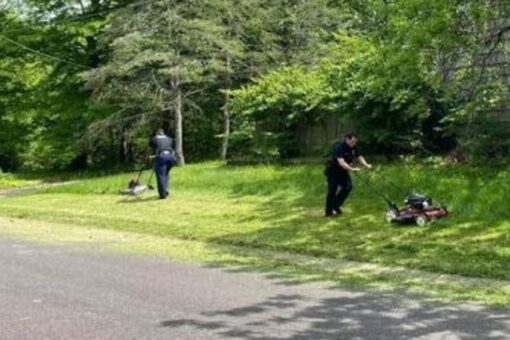 Kansas police officers mow lawn for elderly widower between service calls