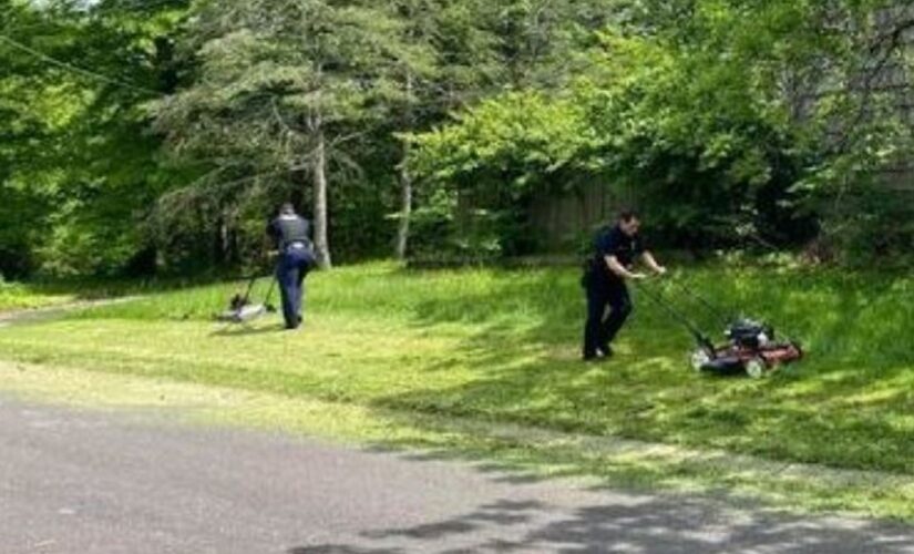 Kansas police officers mow lawn for elderly widower between service calls