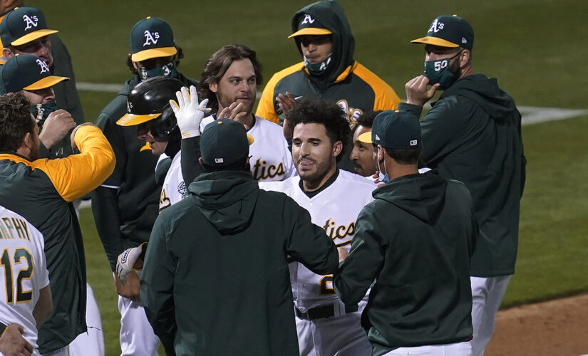 Laureano hits 2 HRs, then winning sac fly as A’s beat Astros