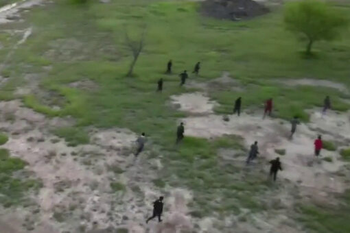 Fox News spots migrant group running across southern border into US